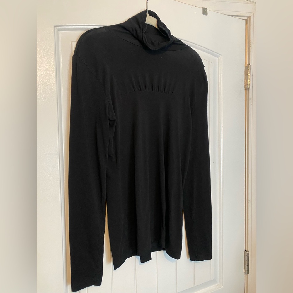 Women’s black turtleneck